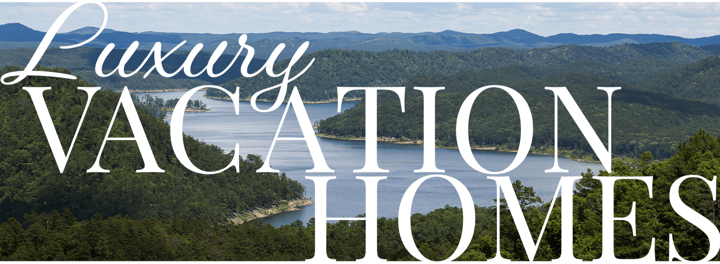 Text overlay reads "Luxury Vacation Homes" above a scenic view of a lake surrounded by mountains and forests.